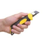 Black and yellow handled utility knife or box cutter